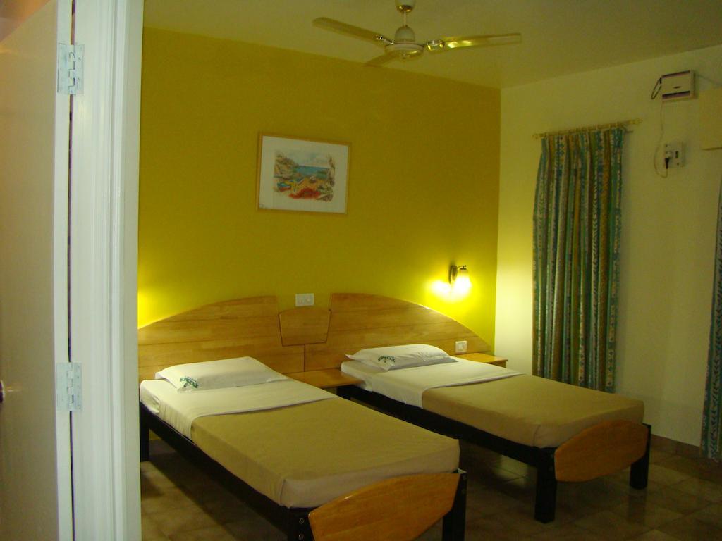 Tom'S Hotel Bangalore Quarto foto